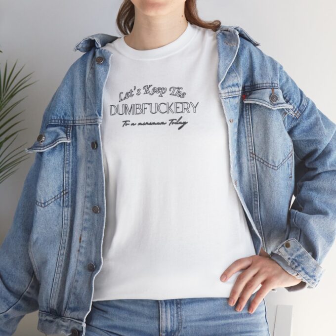 A woman wearing a white t-shirt and jeans.