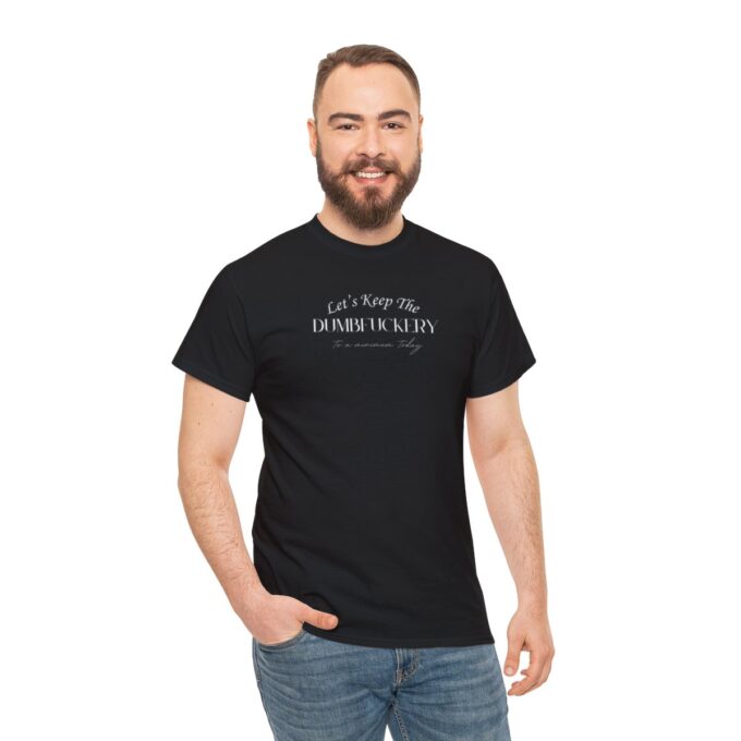 A man wearing a black t-shirt with the words " it's not easy being ugly ".