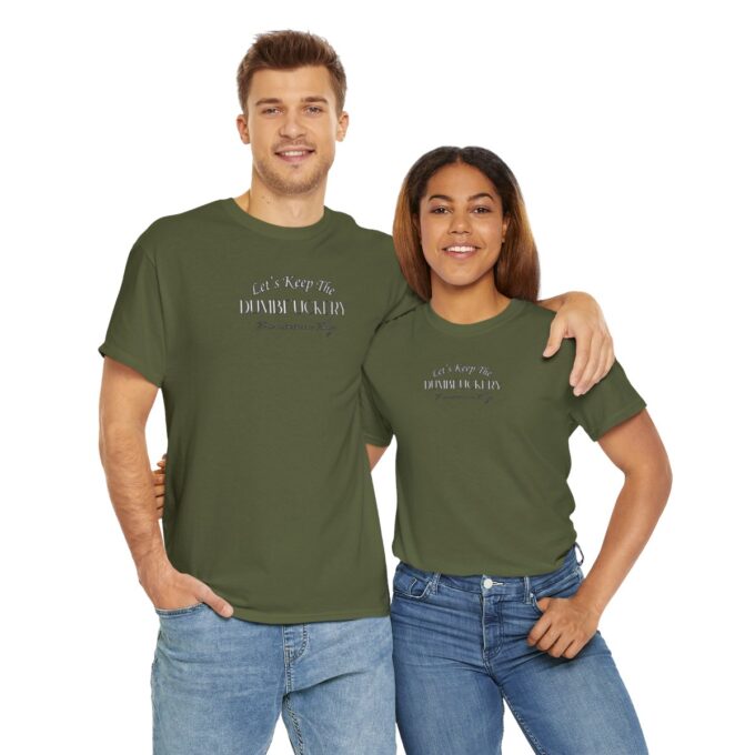 A man and woman wearing green shirts with the words " i am proud to be an american."