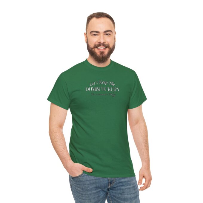 A man with beard and jeans wearing a green shirt