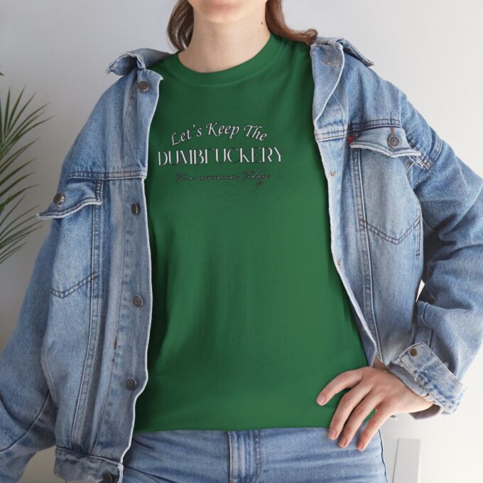 A woman wearing a green shirt and jacket