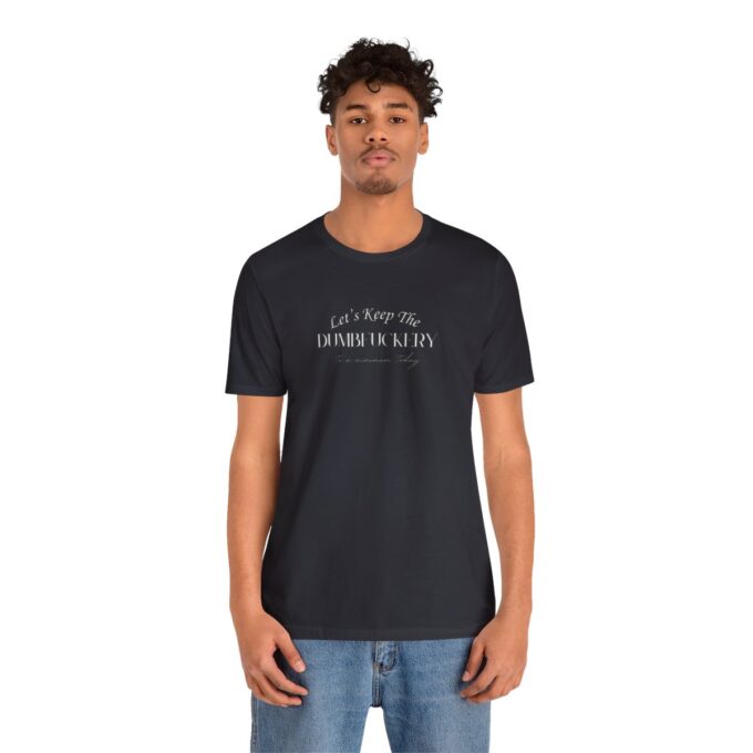 A man wearing a black t-shirt with the words " nothing is impossible."