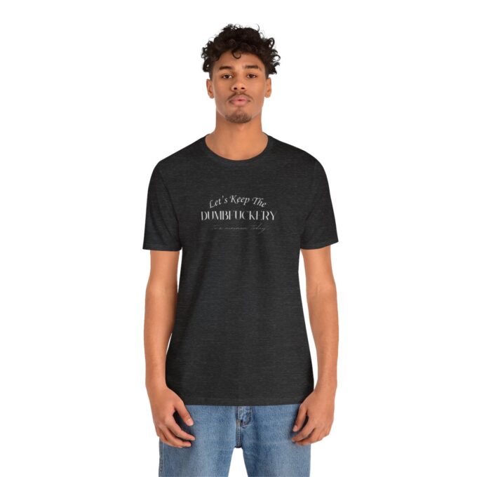 A man wearing a black t-shirt with the words " i am proud to be an american."