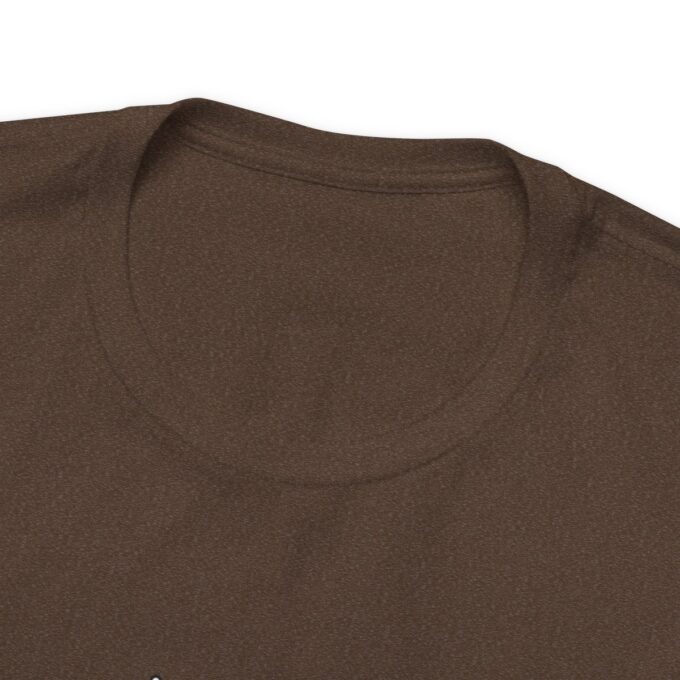 A brown shirt with a white logo on it