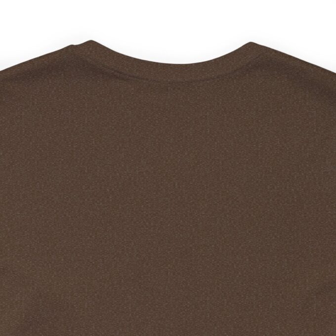 A brown shirt with a white logo on it