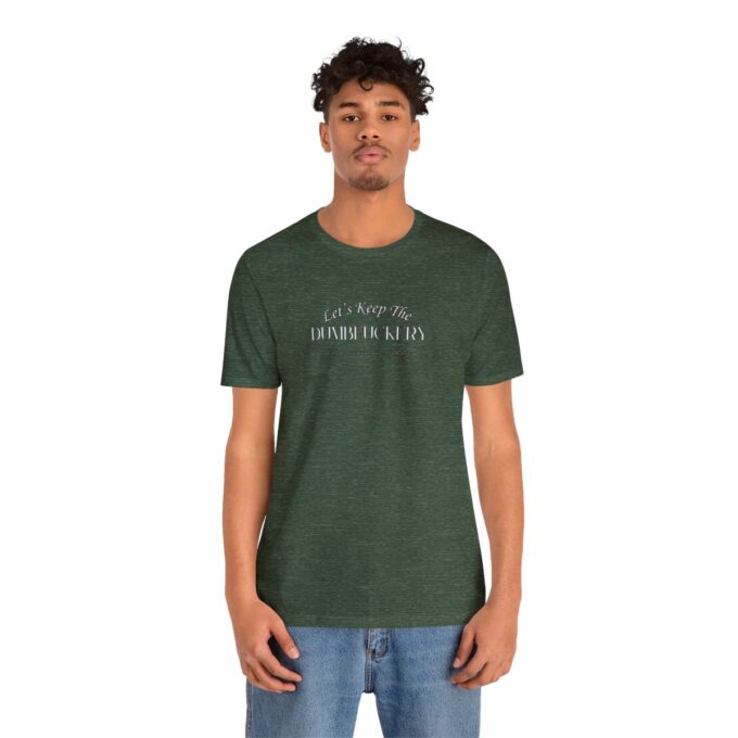 A man wearing a green t-shirt with the words " i am not a person of color ".