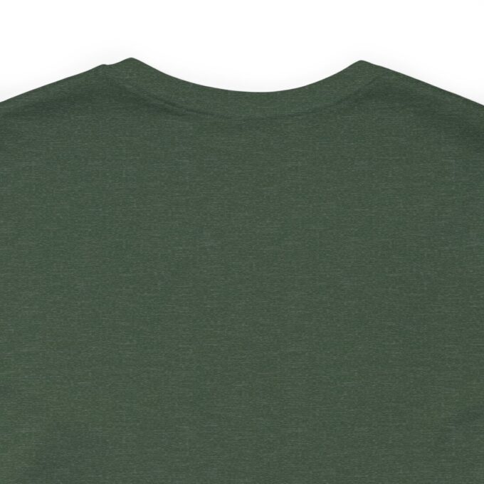 A green shirt with a white logo on it