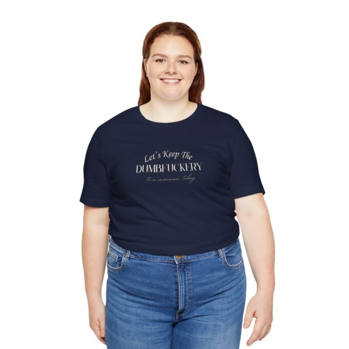 A woman wearing jeans and a t-shirt with the words " let 's talk to someone ".