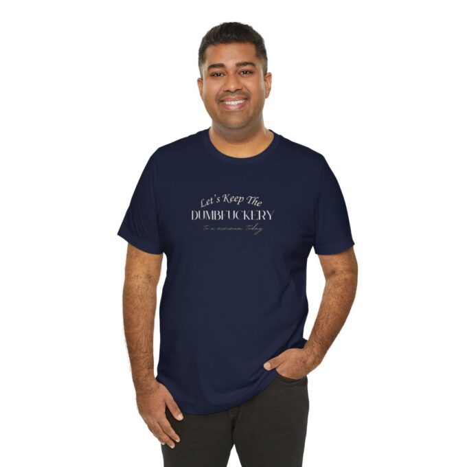 A man wearing a navy blue t-shirt with the words " i am not an atheist sect ".