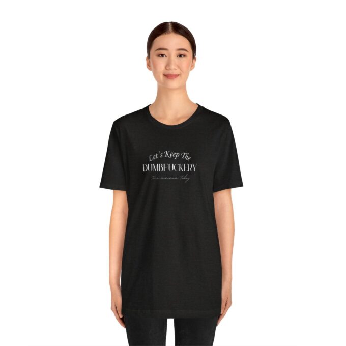 A woman wearing black t-shirt with white lettering.