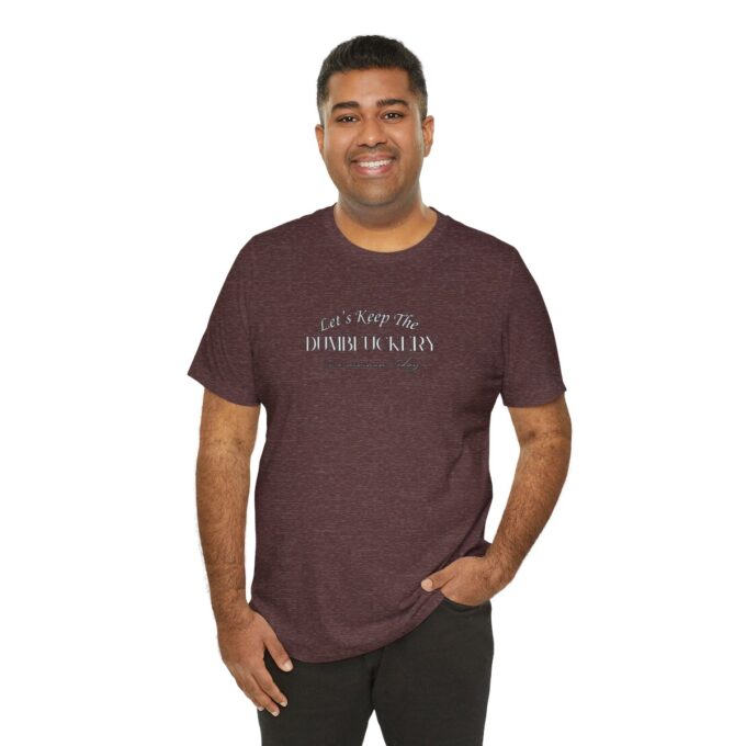 A man wearing a maroon t-shirt with the words " i am not your father 's class ".