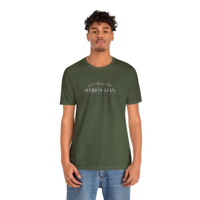 A man wearing a green t-shirt with the words " nothing but something else ".