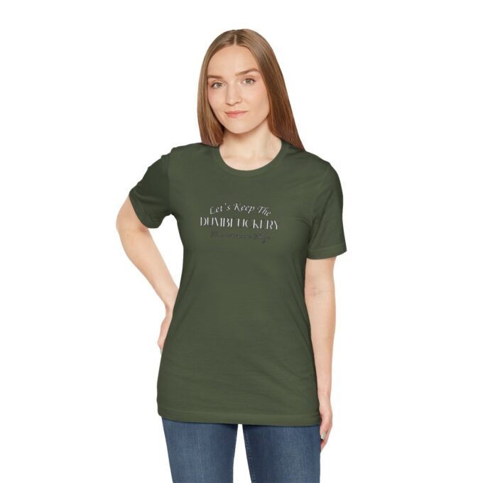A woman is wearing a t-shirt with the words " i am an american hero ".
