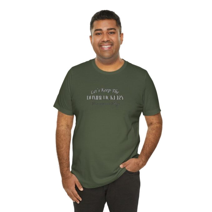 A man wearing a green shirt and black pants.