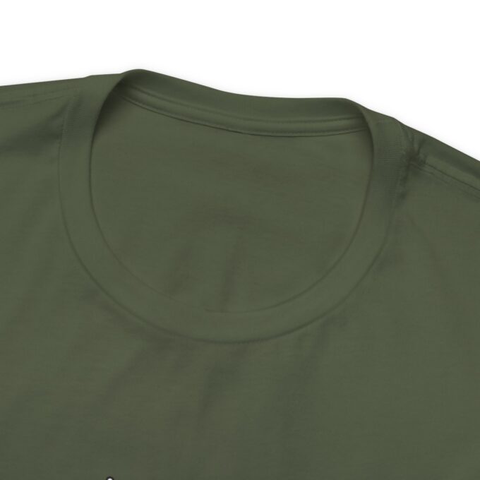 A close up of the chest pocket on a green shirt