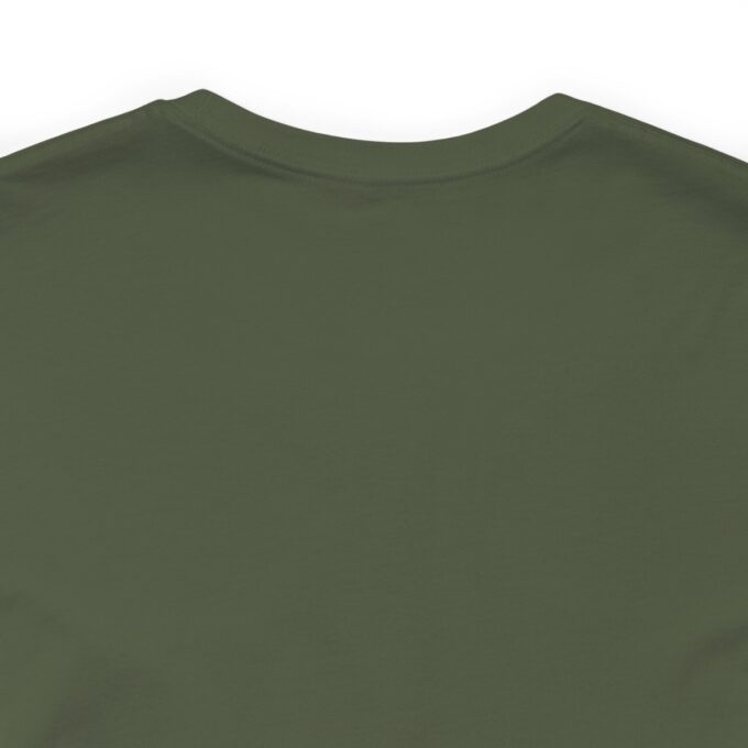 A close up of the chest area of a green shirt